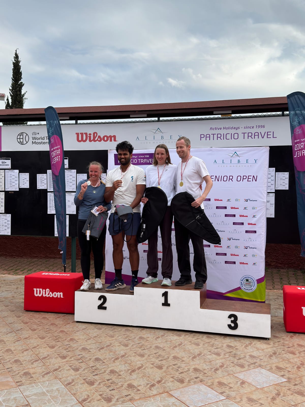 Manvir at a tennis tournament medal ceremony